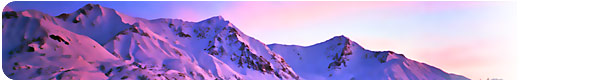 2月─夕日に赤く染まる雪山